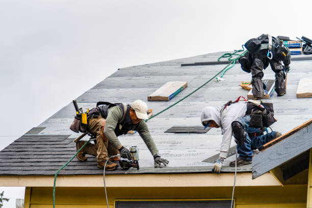Professional Roofing technician working in Goshen, MA